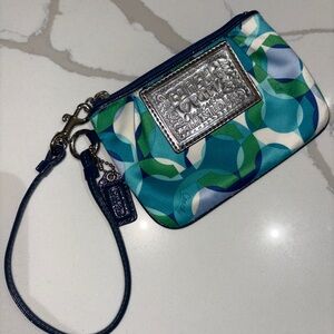 Blue and green Y2K Coach Poppy wristlet with blue leather strap
